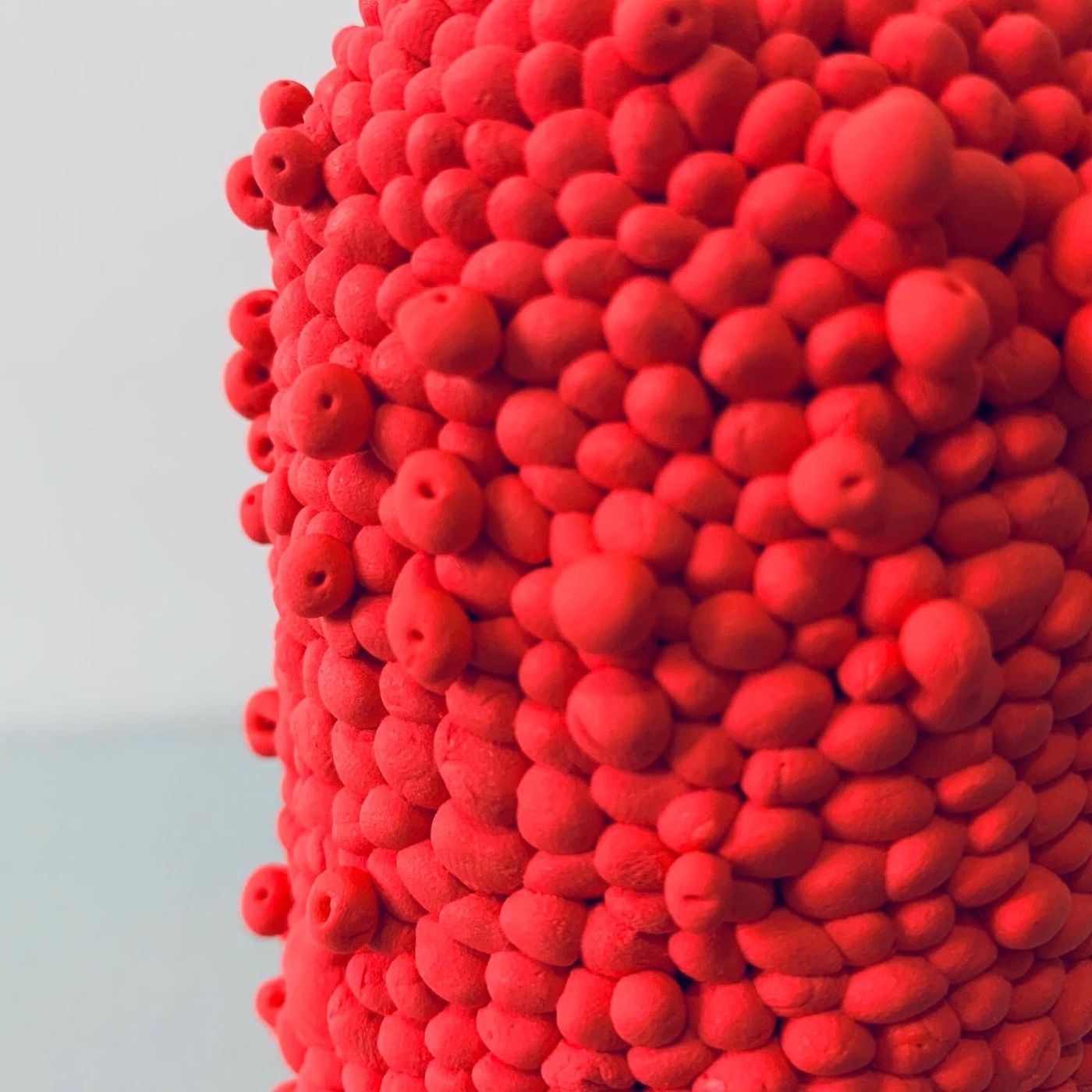 Through the Darkest Hour — red ceramic close-up