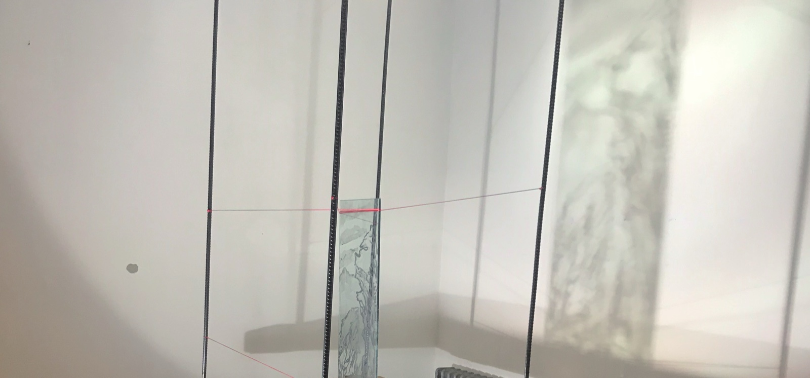 Dialogue With Traditional — glass panels with red thread and ink shadows